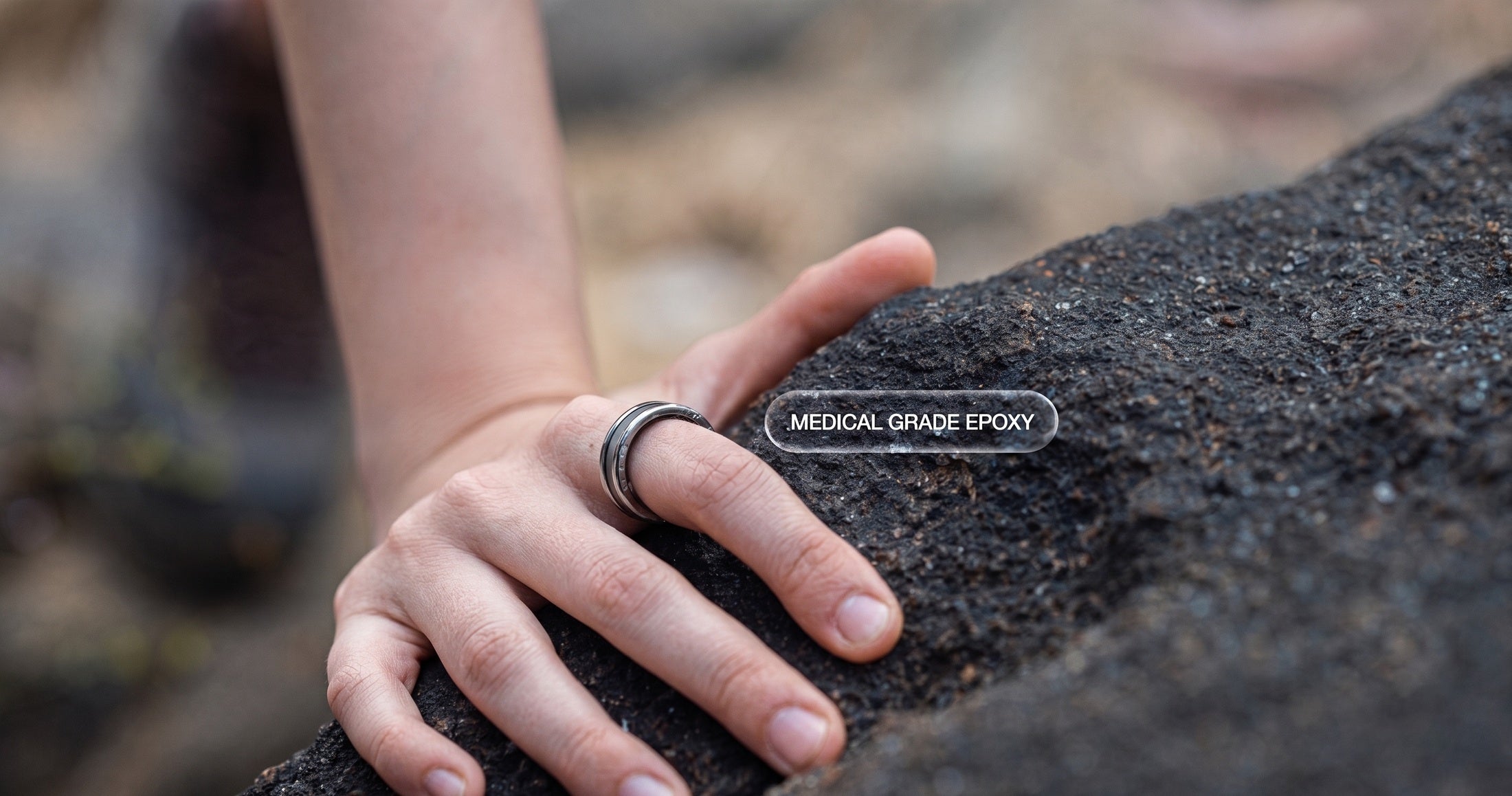 Ring One Gen-2 medical grade epoxy seal, shown worn outdoors